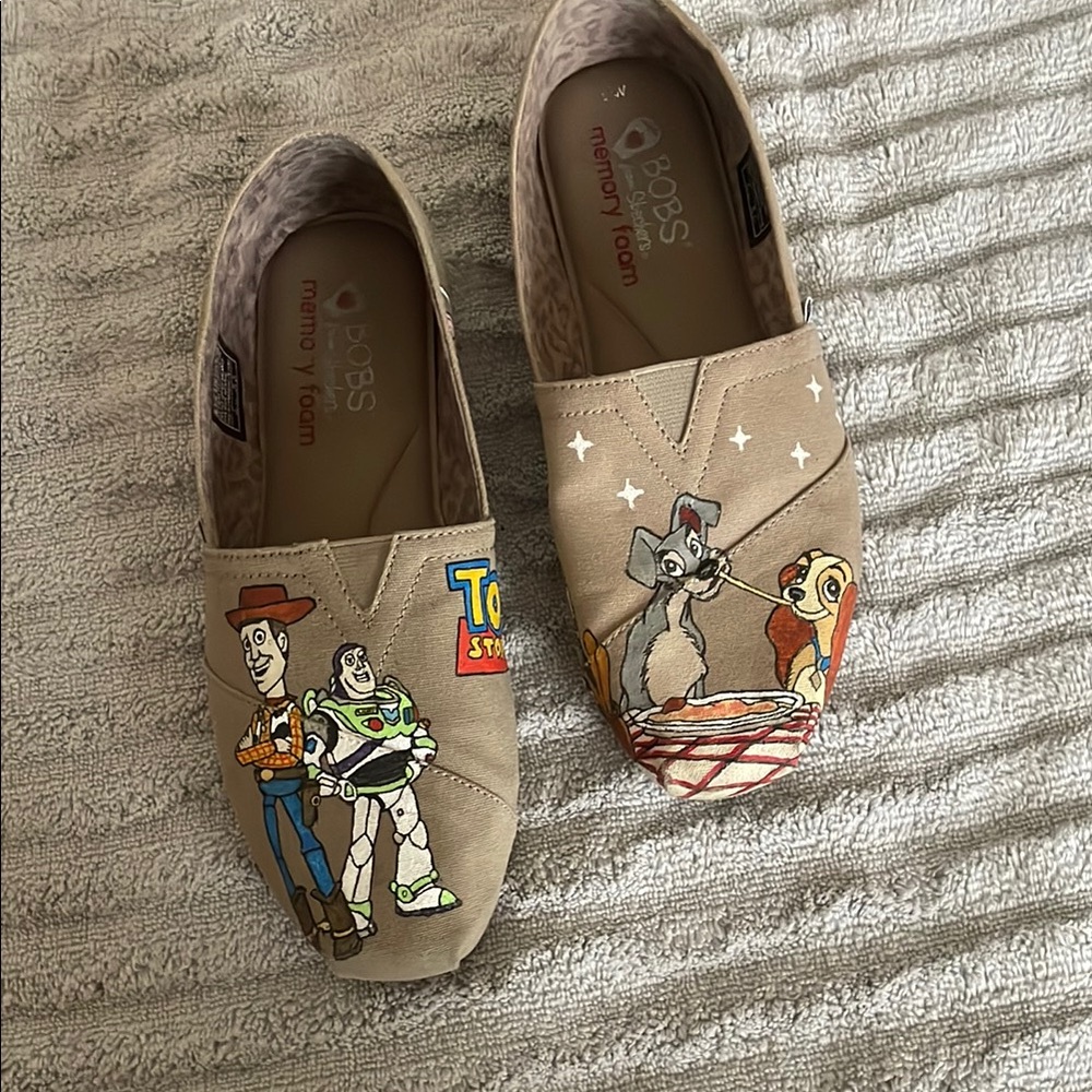BOBS from Skechers Tan Flats with Toy Story Design